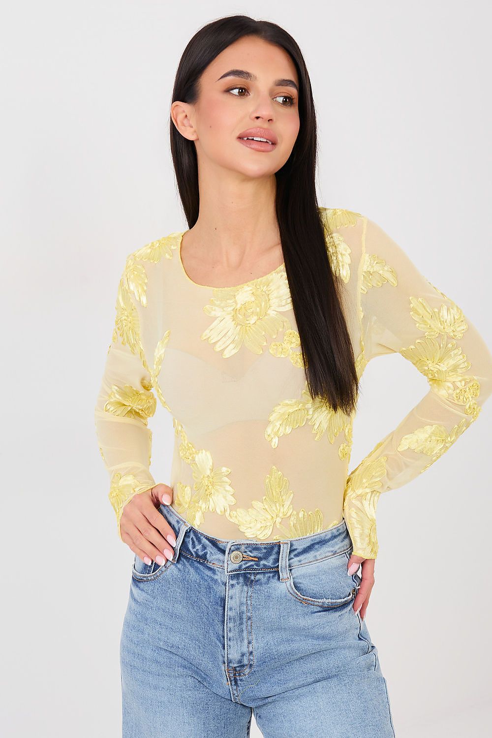  Yellow embroidered mesh blouse with floral pattern and long sleeves.