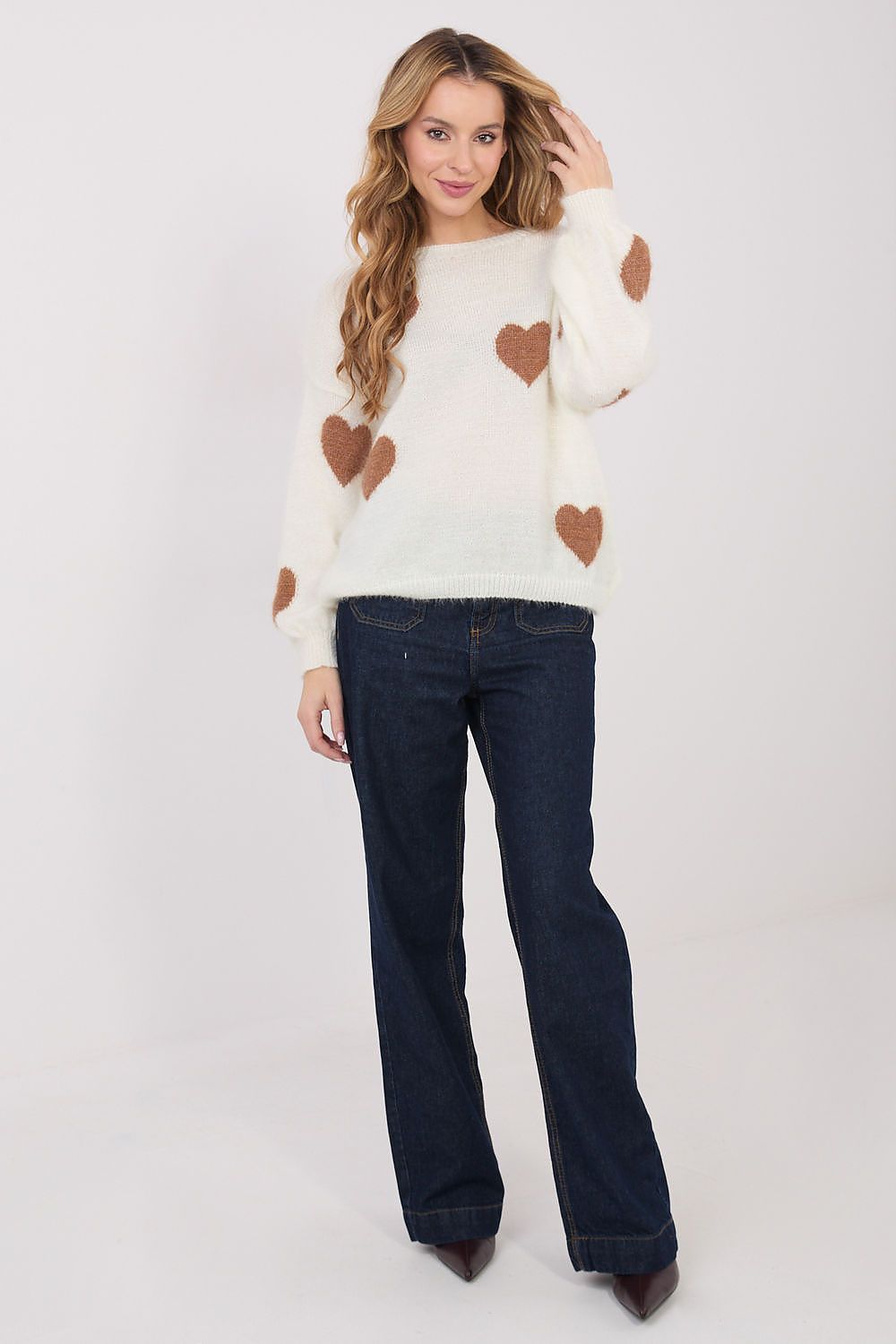  Beige women’s sweater with heart print and puffy sleeves.