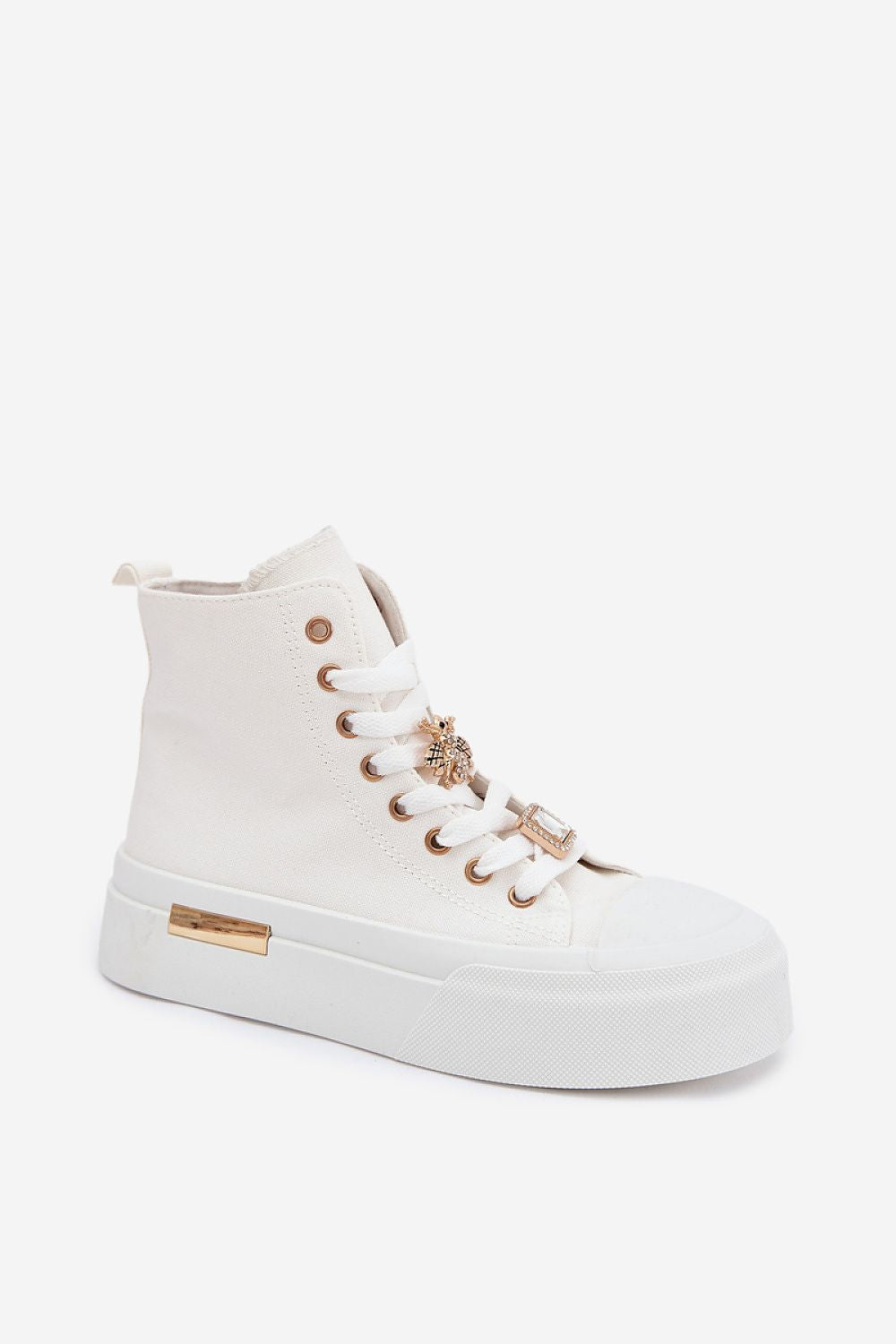 White high-top sneaker with gold accents on a white background