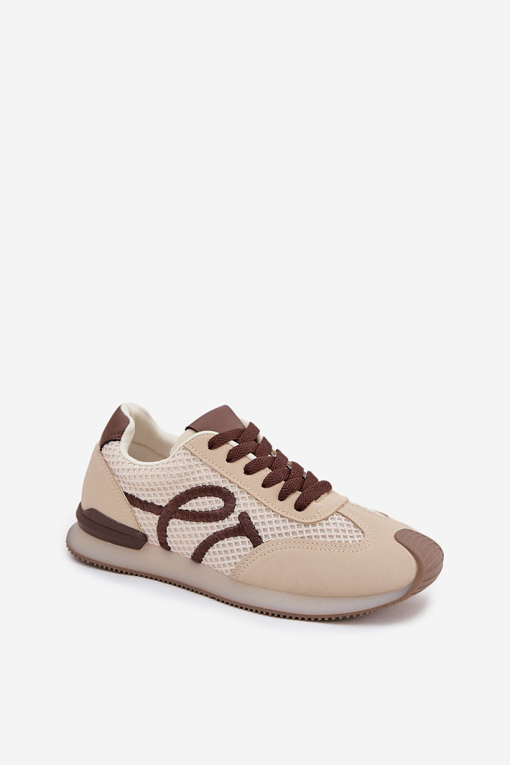 Beige sneaker with brown accents on a white background