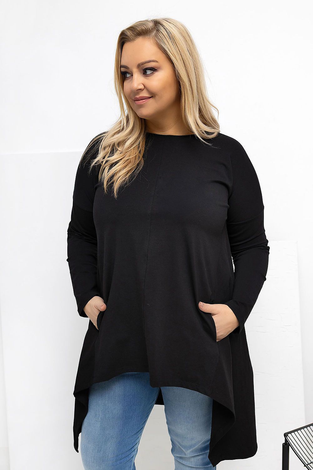  women's relaxed-fit blouse with asymmetrical shorter front and longer back design.