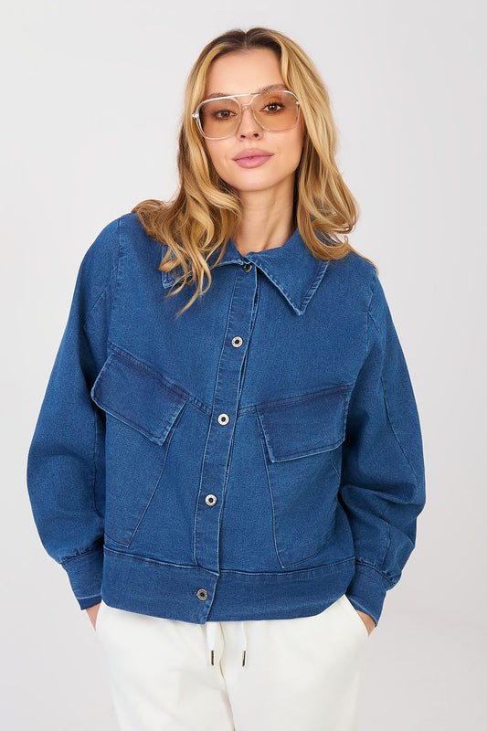 Woman wearing a blue denim jacket on a white background