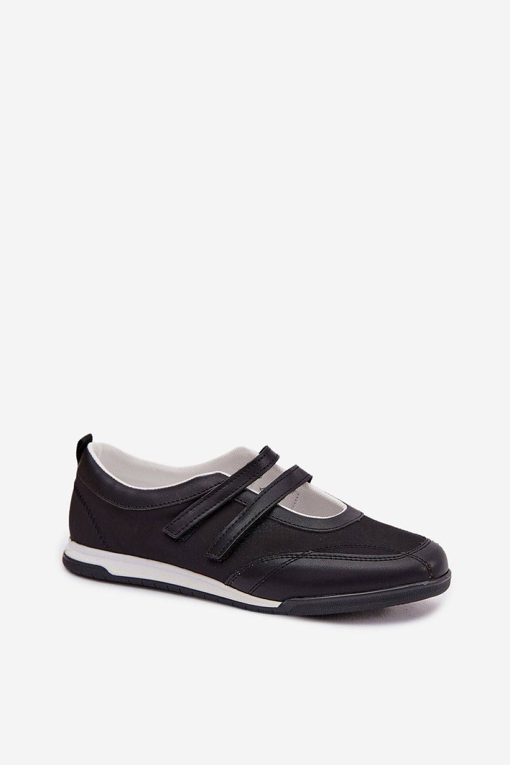 Black sneaker with white sole on a white background
