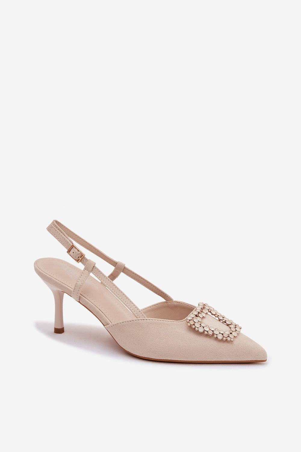 Beige high-heeled shoe with embellishments on a white background