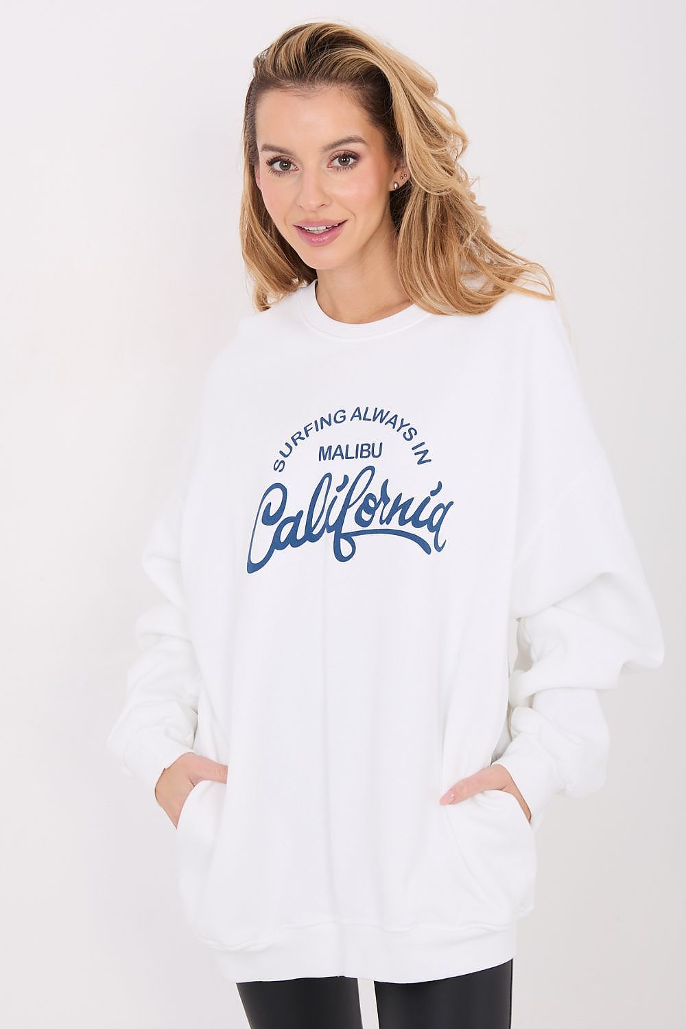  oversized sweatshirt featuring a bold Malibu California graphic across the front.