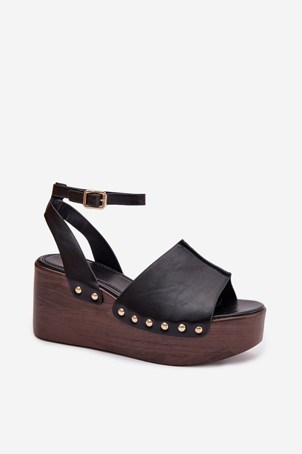 Black platform sandal with wooden sole on a white background