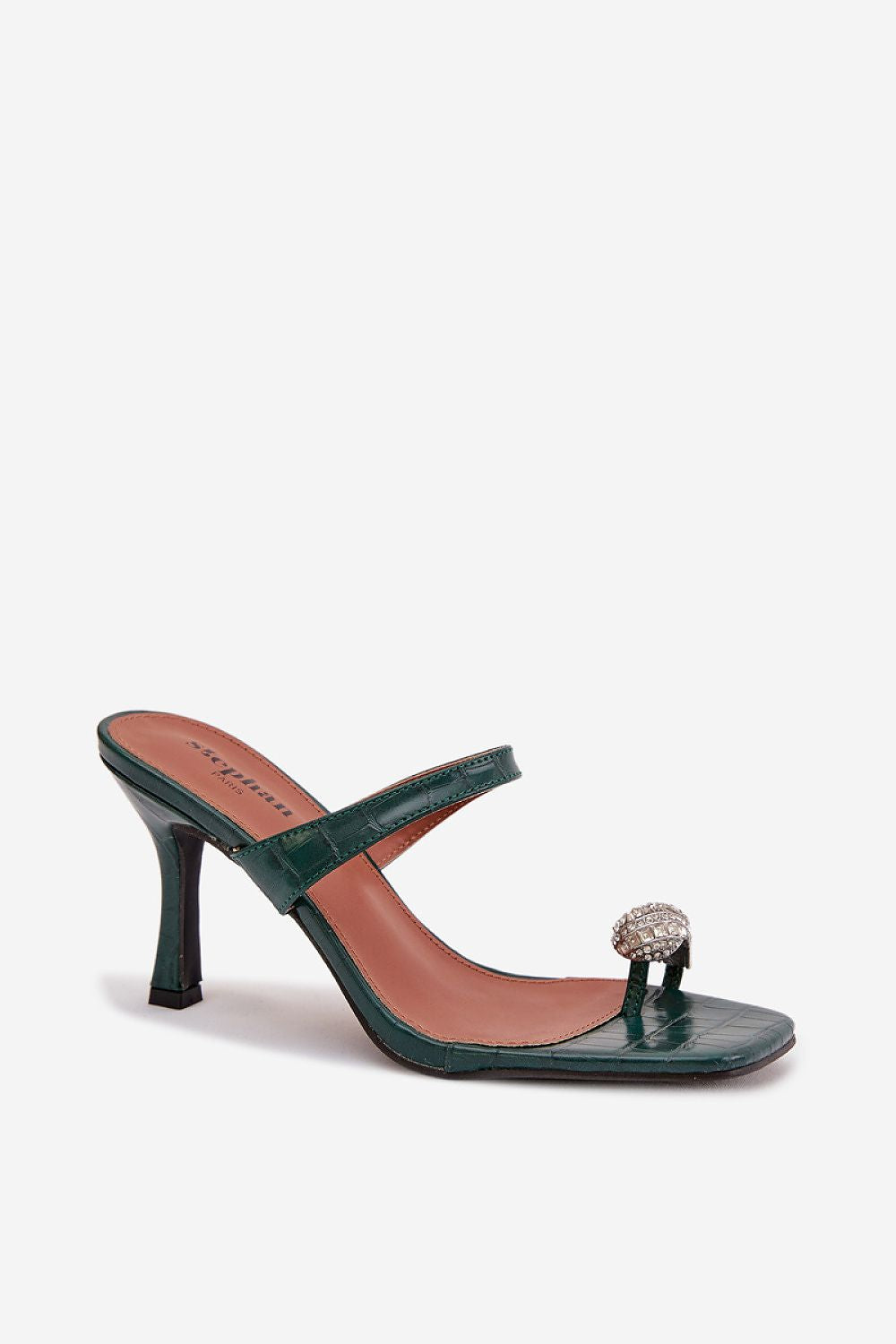 Green high-heeled sandal with a decorative clip on a white background