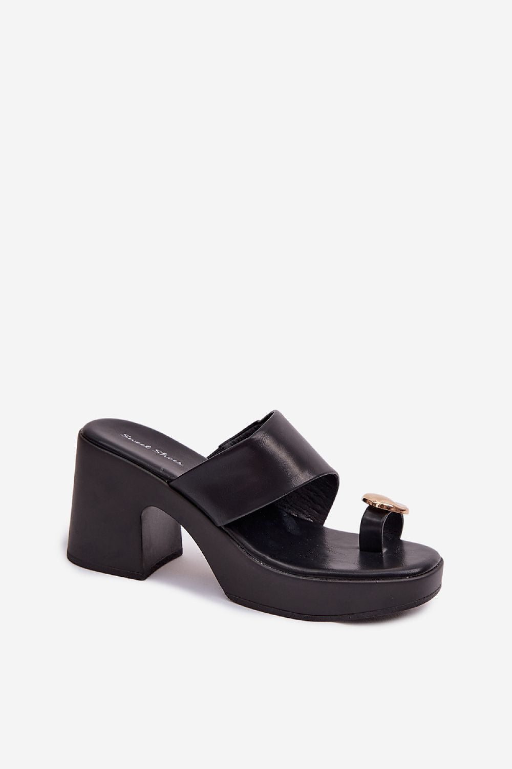 Black sandal with a platform sole on a white background