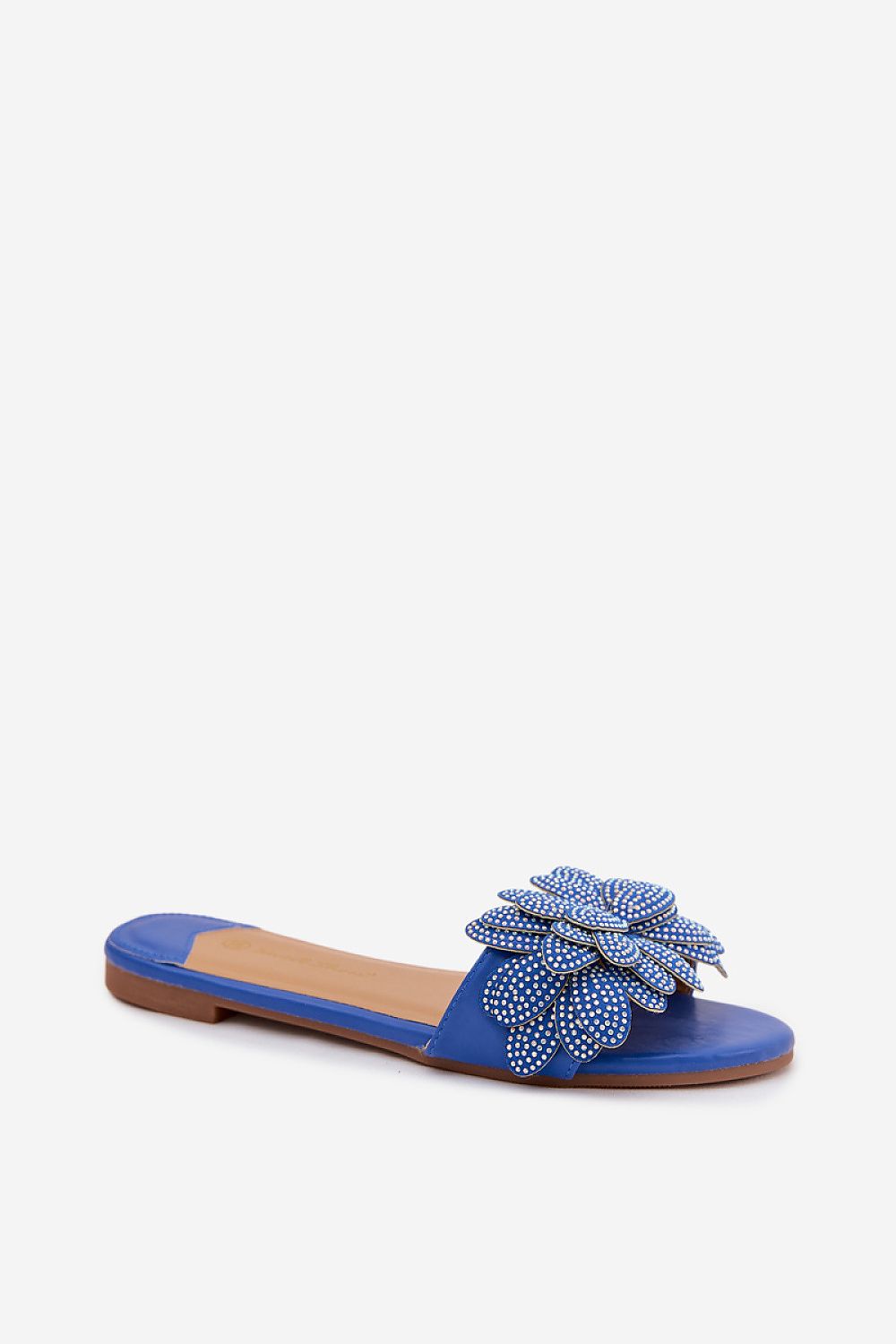Blue sandal with decorative flower on a white background