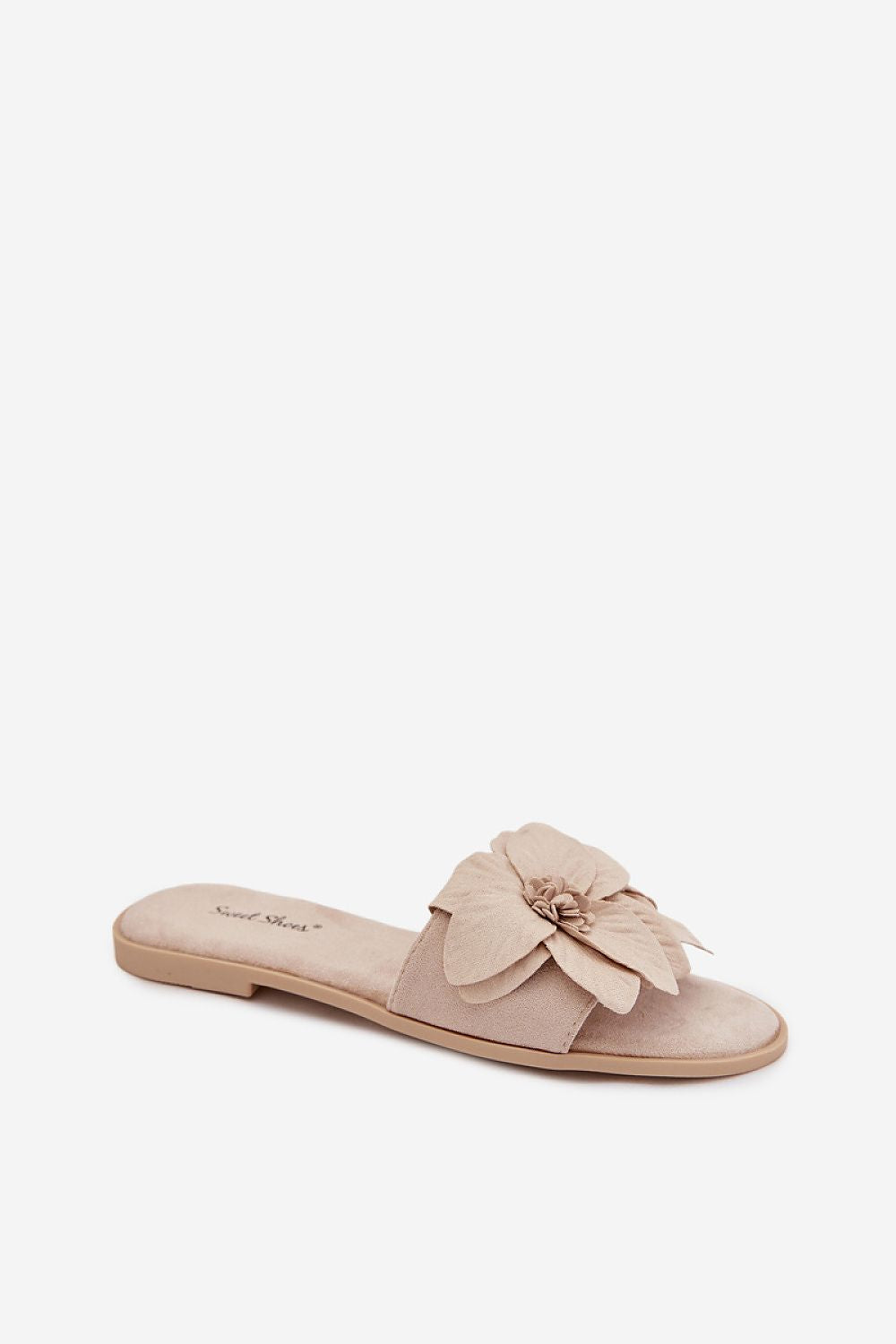 Beige sandal with a bow on a white background