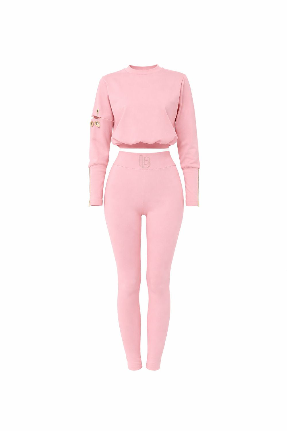 Pink sweatshirt and pants set on a white background