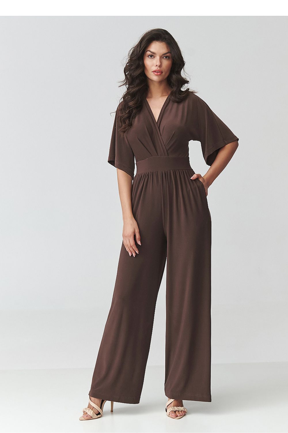  SR Celestine Luxe black jumpsuit with elegant wrap neckline and flowing wide-leg trousers