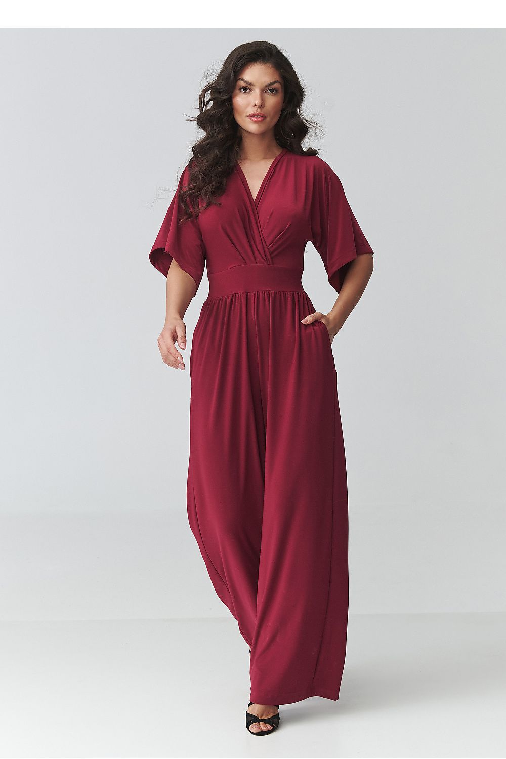  SR Celestine Luxe red jumpsuit with elegant wrap neckline and flowing wide-leg trousers