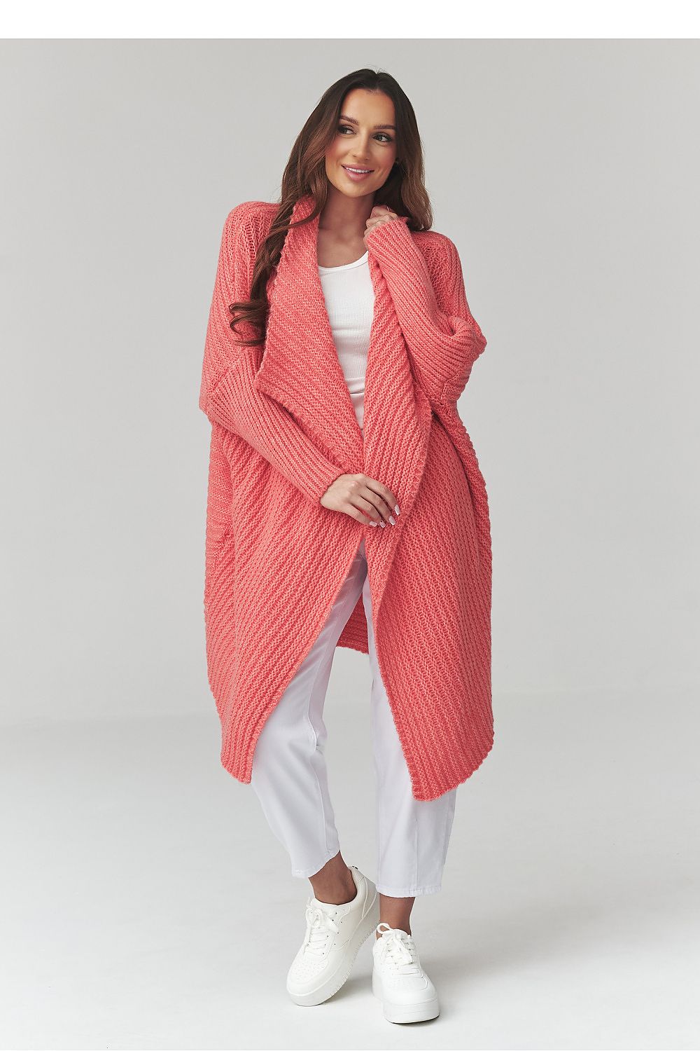  Women's longline oversized pink knitted cardigan with textured knit weave.