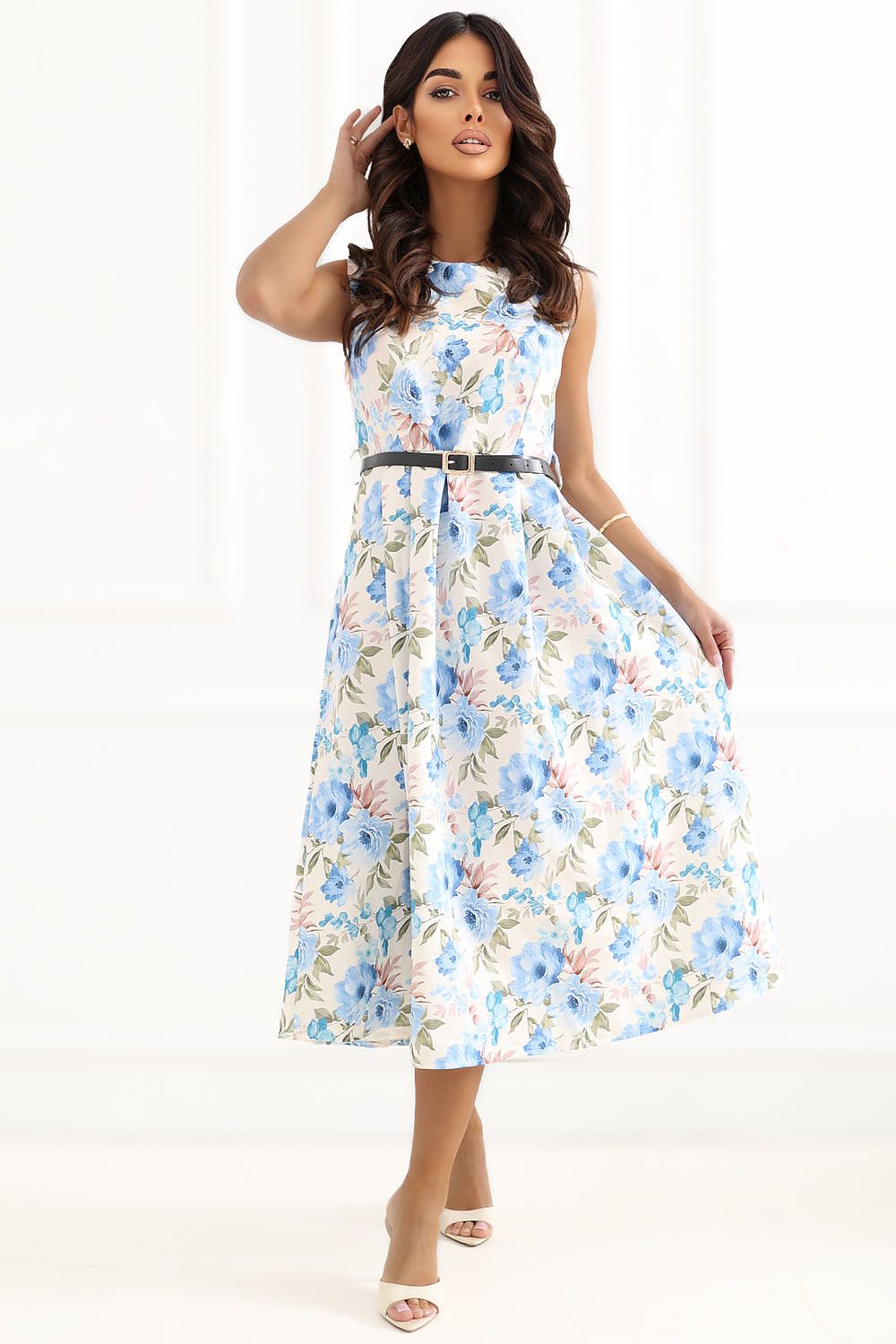 Woman wearing a floral dress on a white background