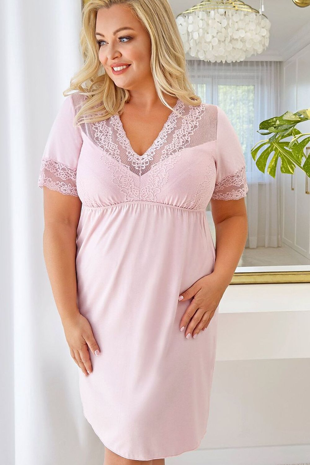  Soft pink lace-trim plus size nightshirt designed for comfortable sleep and relaxed evenings at home. 2