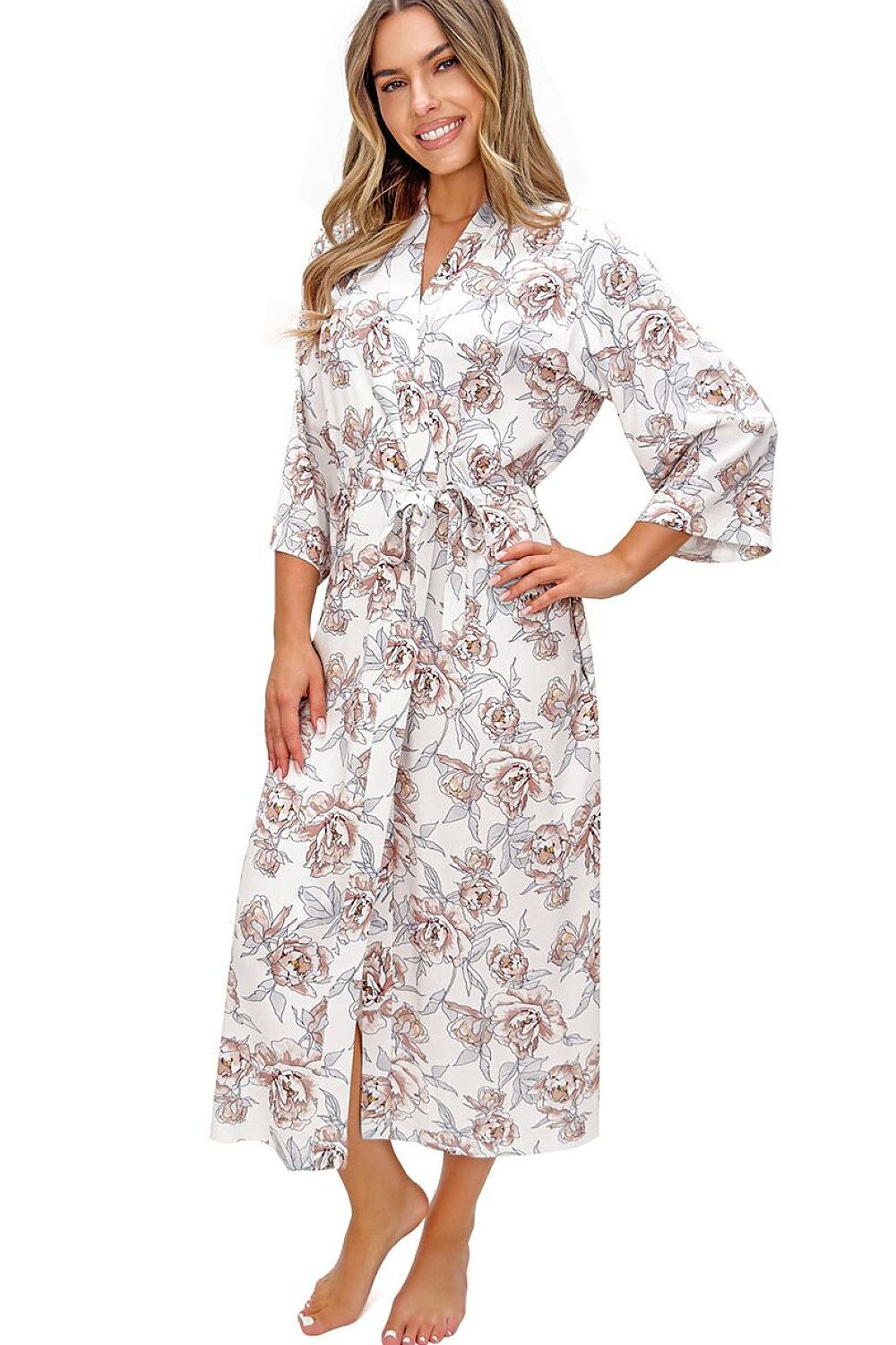 Woman wearing a floral patterned robe on a white background