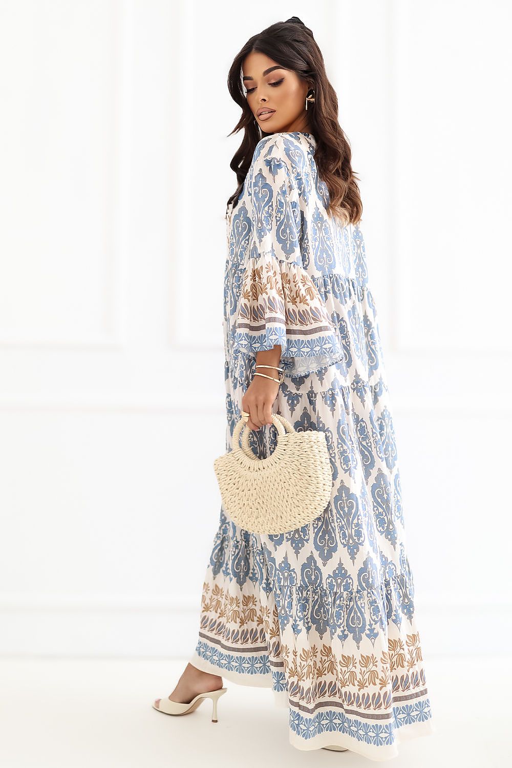  Blue boho maxi dress with artistic print and flowing silhouette