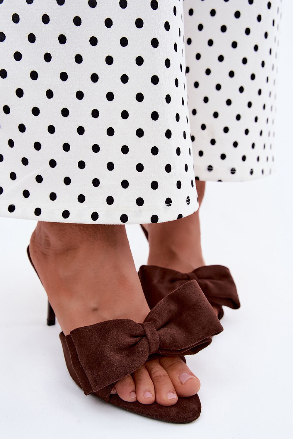  Brown suede-look stiletto mules with elegant oversized bow detail
