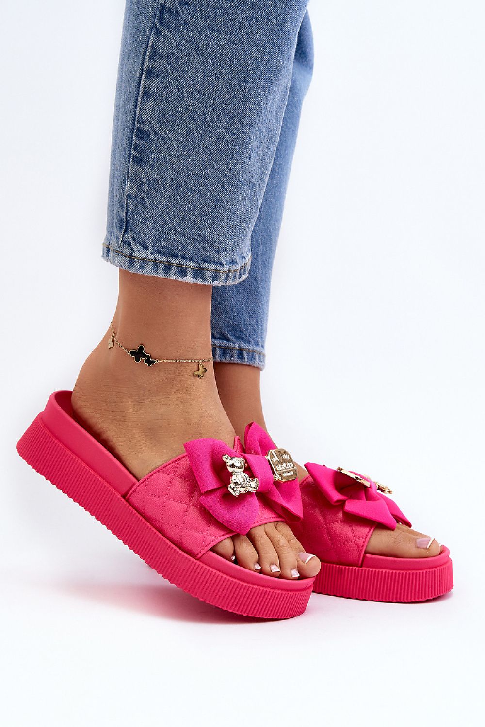 Pink platform sandals with oversized fabric bow and decorative bear buckle detail-2