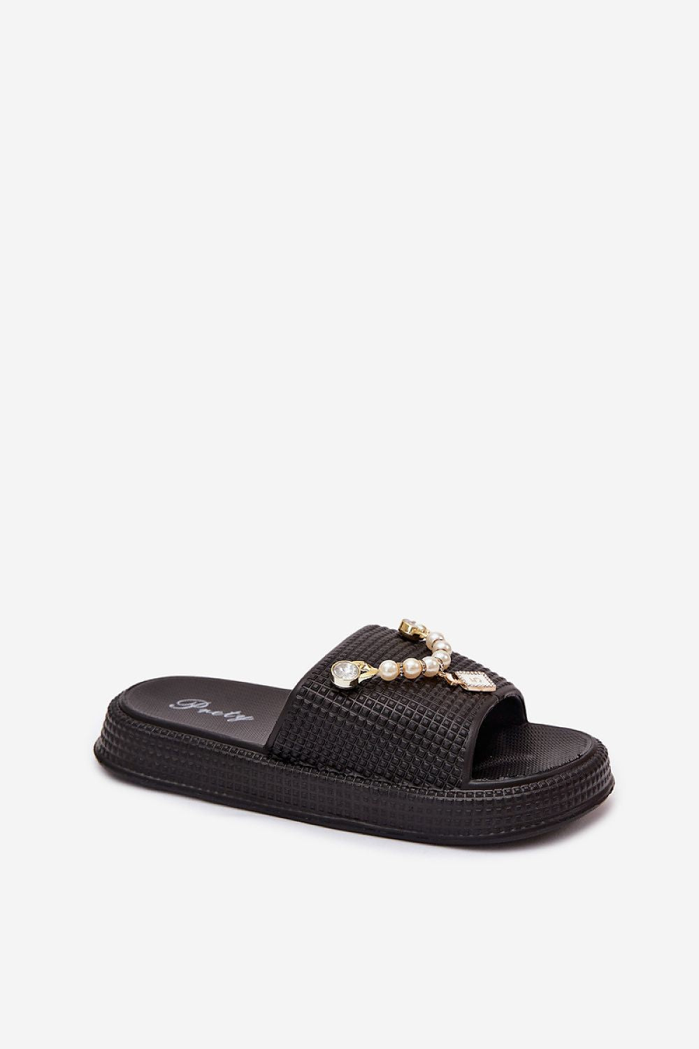 Brown suede slipper with tassels on a white background