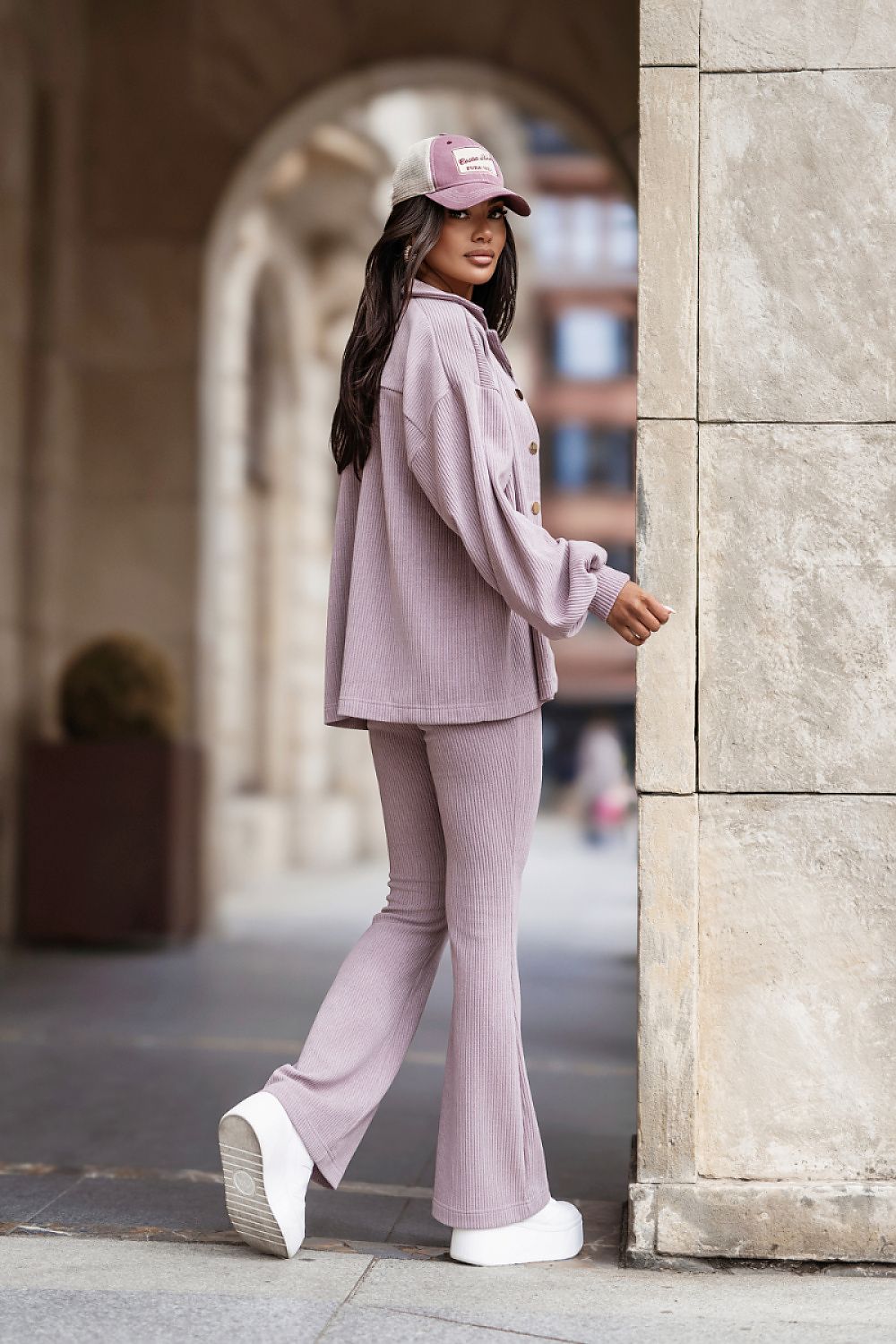  Women's violet corduroy two-piece set with relaxed shirt and matching trousers.