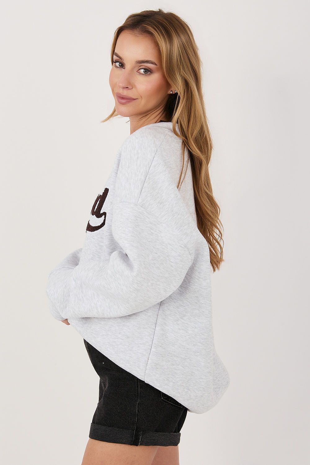  Women's grey casual embroidered sweatshirt styled with jeans and trainers