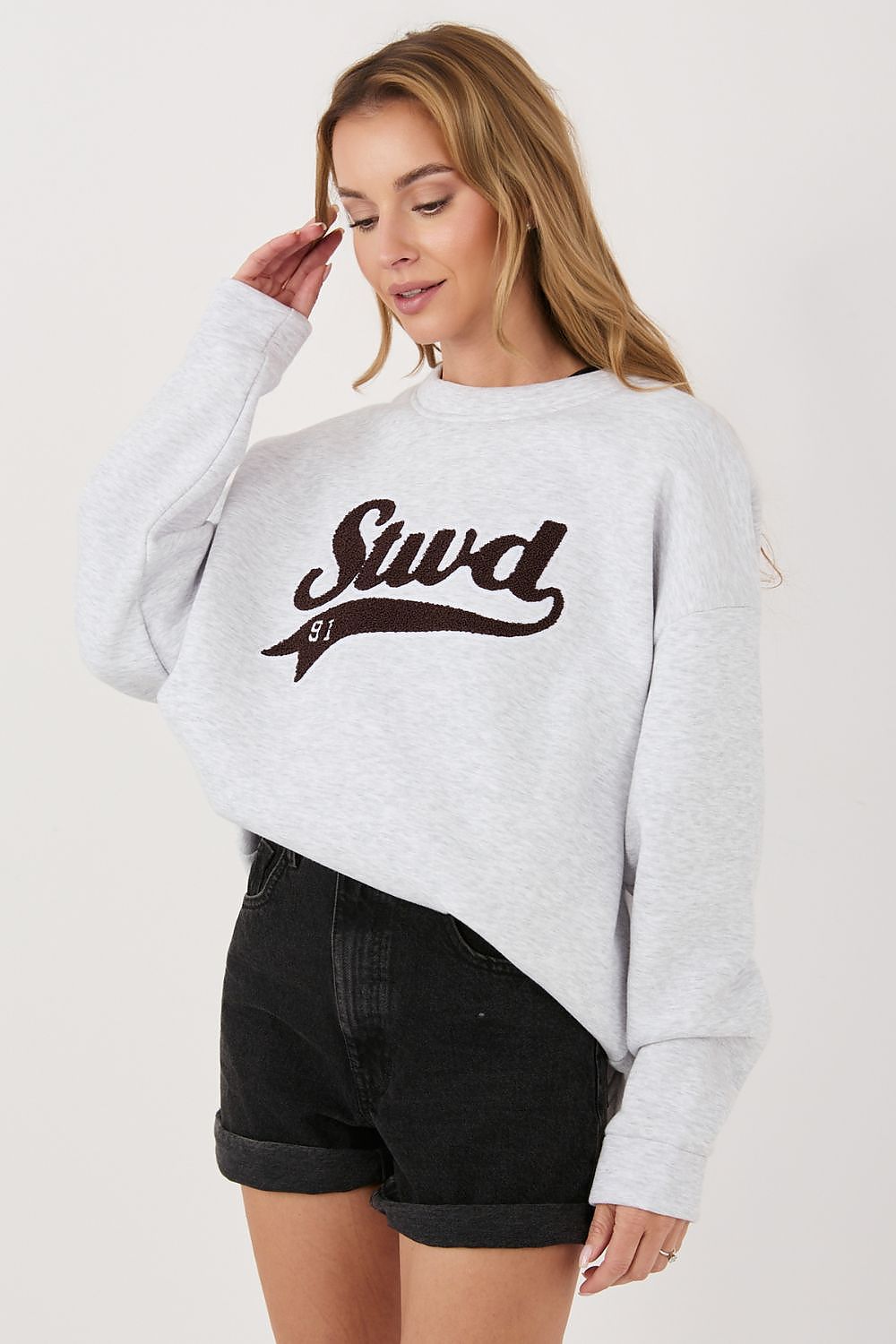  Women's grey casual embroidered sweatshirt styled with jeans and trainers-2