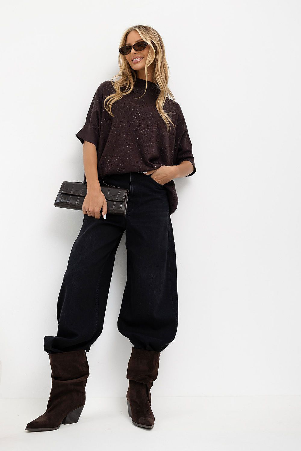 Women's brown oversized turtleneck sweater with short sleeves and rhinestone detailing-full model image
