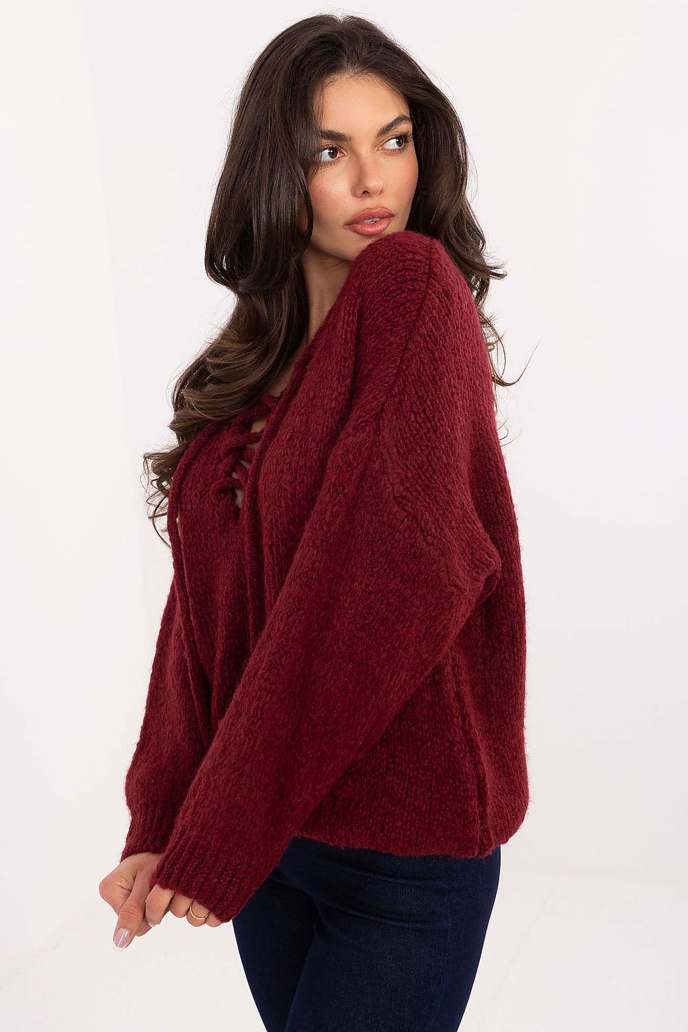 Women's red sweater with corset-style front lacing and long sleeves-side-view