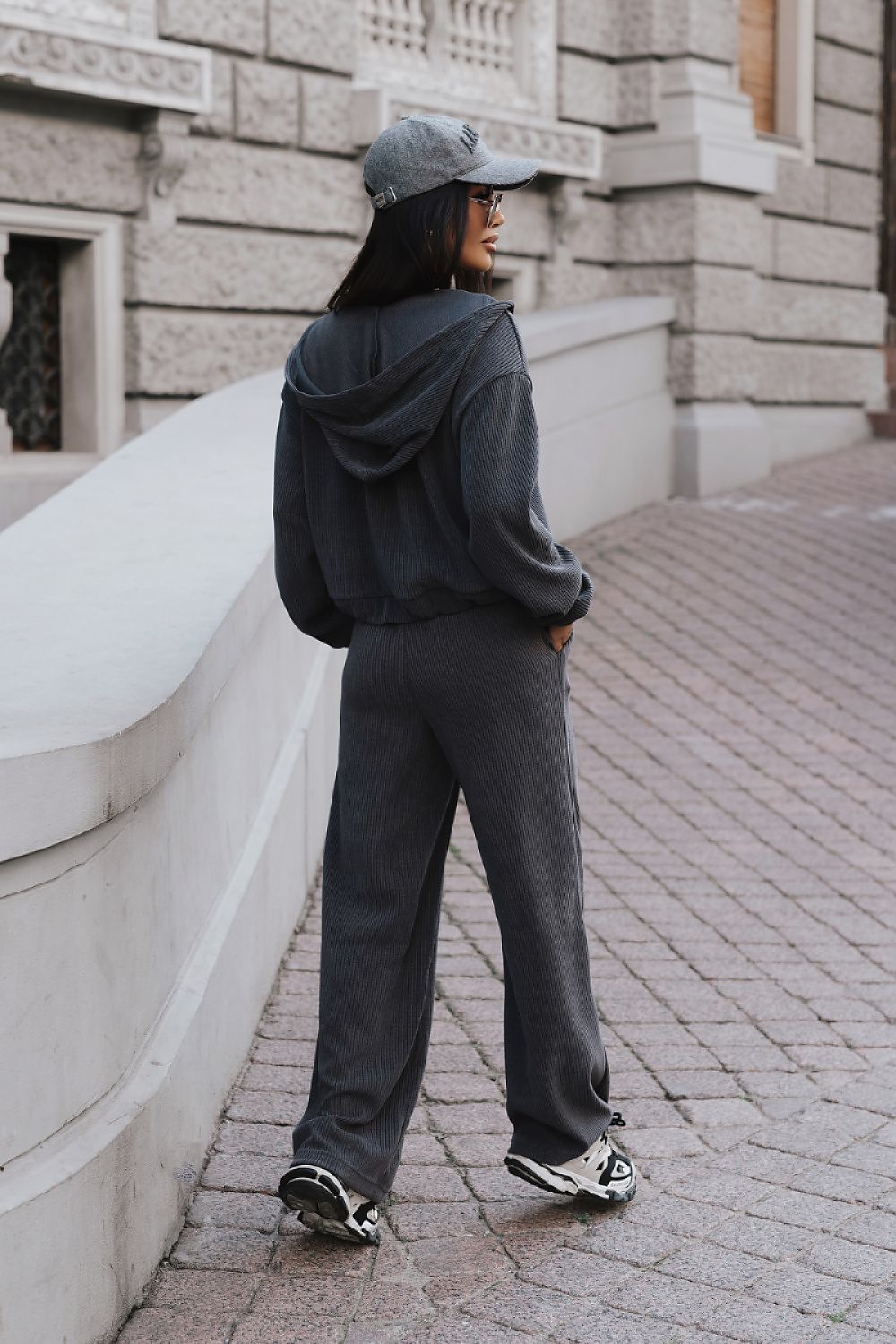 Women's grey cotton-rich knit co-ord styled with white trainers
