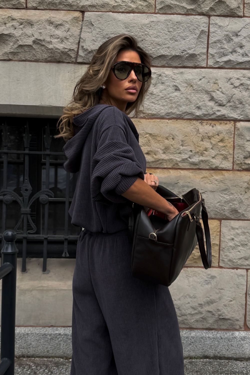 Grey women's two-piece co-ord featuring a long-sleeved sweatshirt and elasticated waist trousers