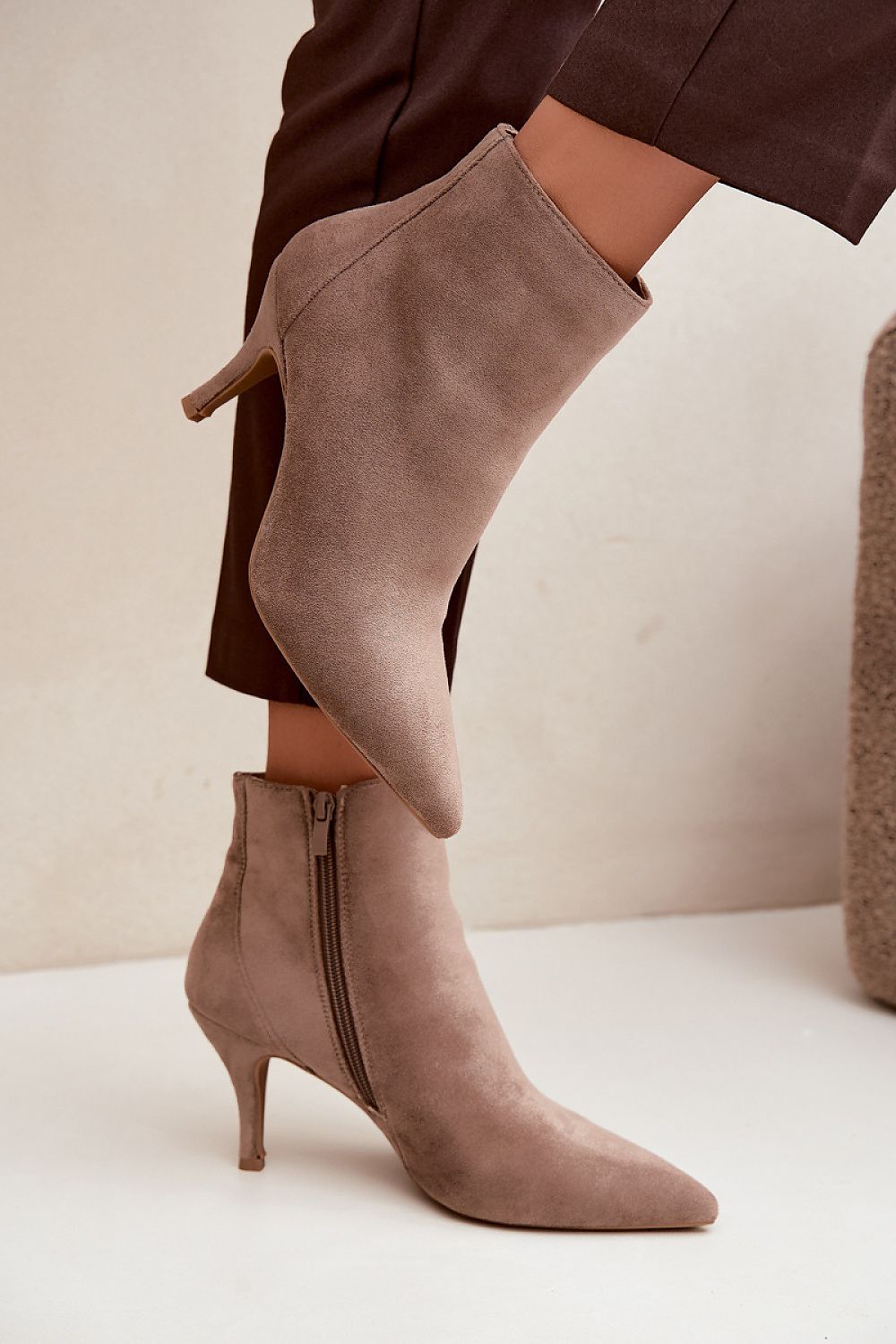   faux-suede women's heeled ankle boots with slim heels and zip fastening beige