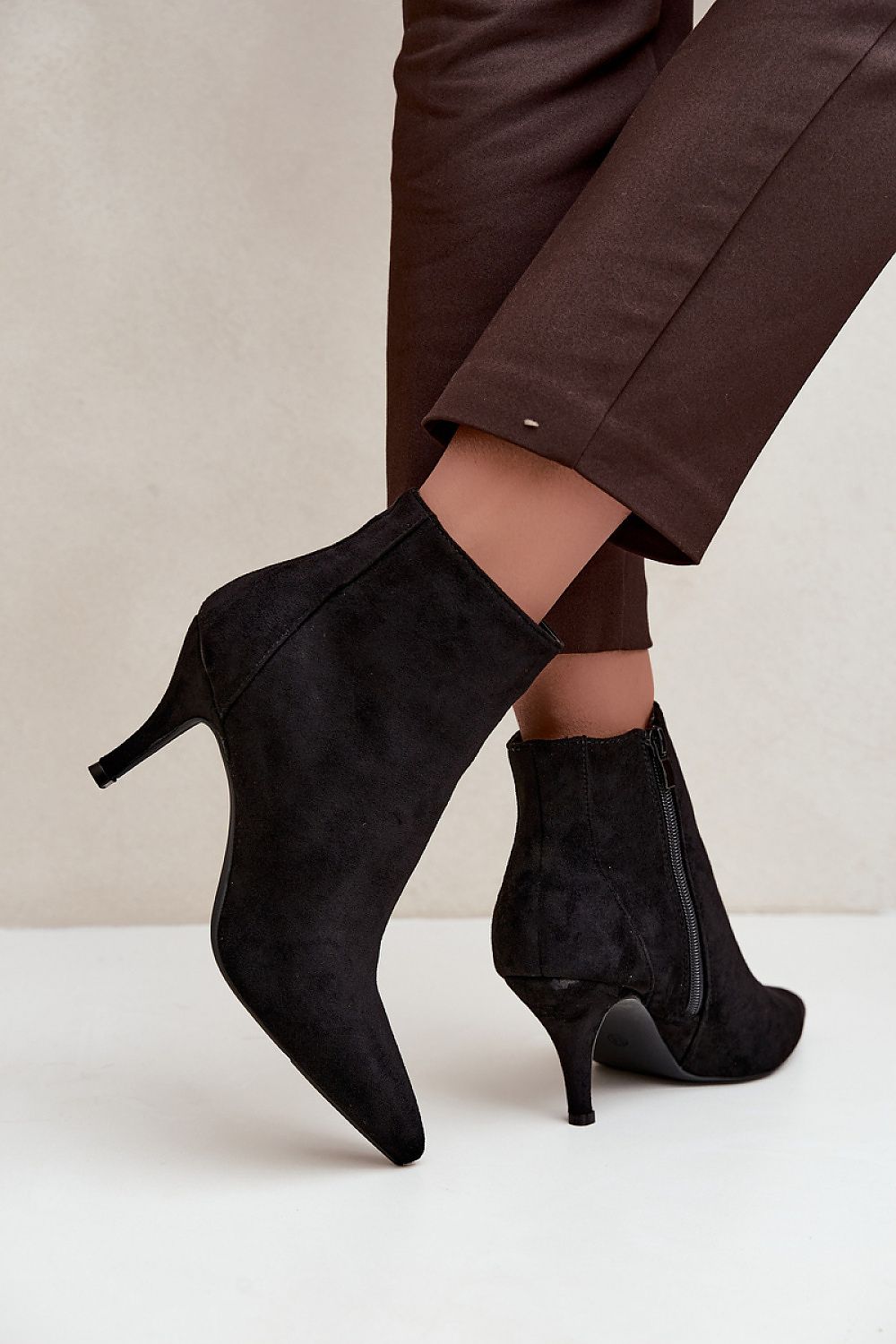   faux-suede women's heeled ankle boots with slim heels and zip fastening black