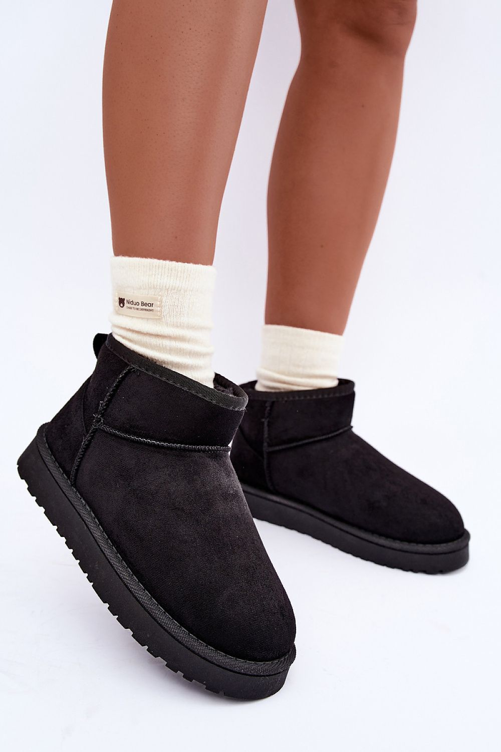   women's slip-on snow boots with thick fur lining and rubber sole black