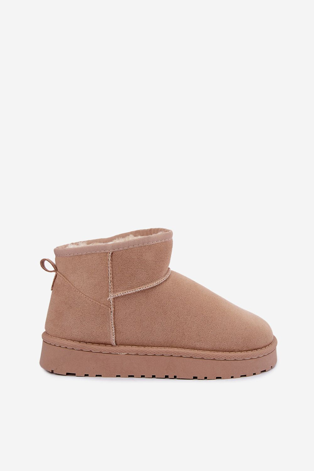 A single toddler's ankle-height suede bootie in a dusty rose pink color, featuring a soft lining and a thick lug sole, shown against a plain light gray background.