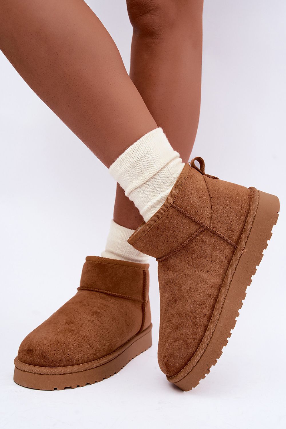   women's slip-on snow boots with thick fur lining and rubber sole brown