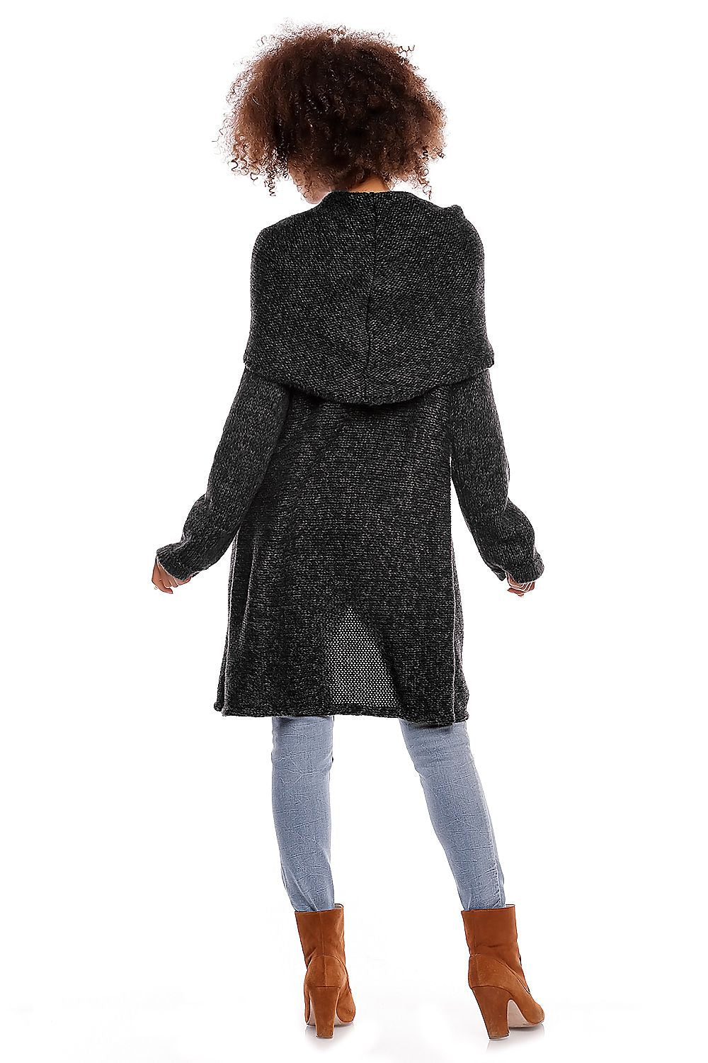 Person wearing a black textured coat with a white background
