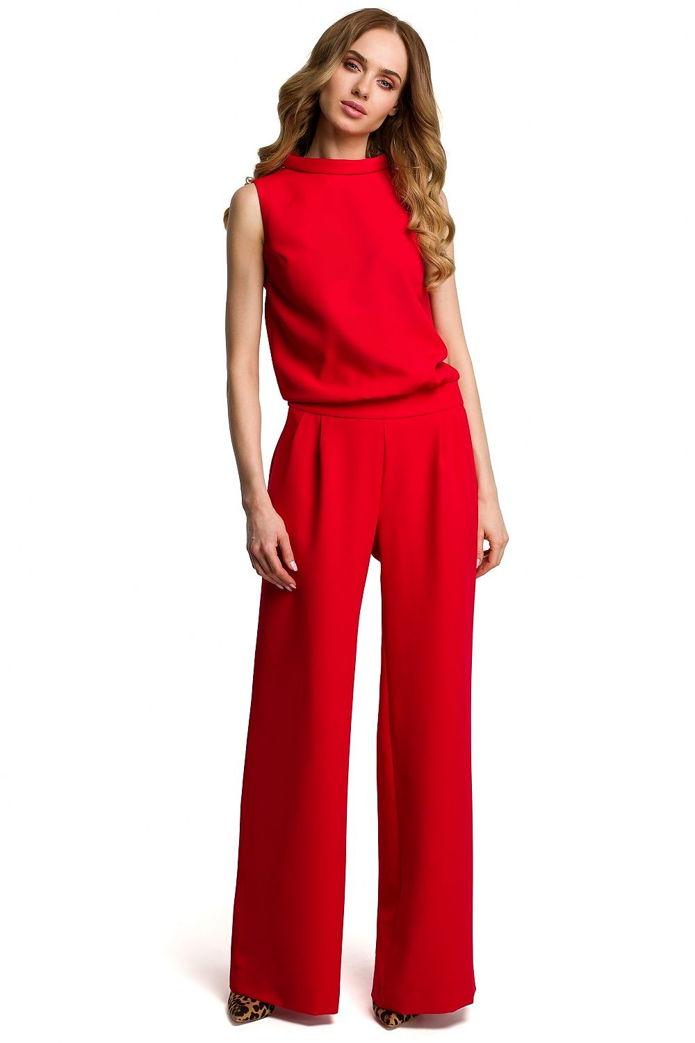 Woman wearing a red outfit on a white background