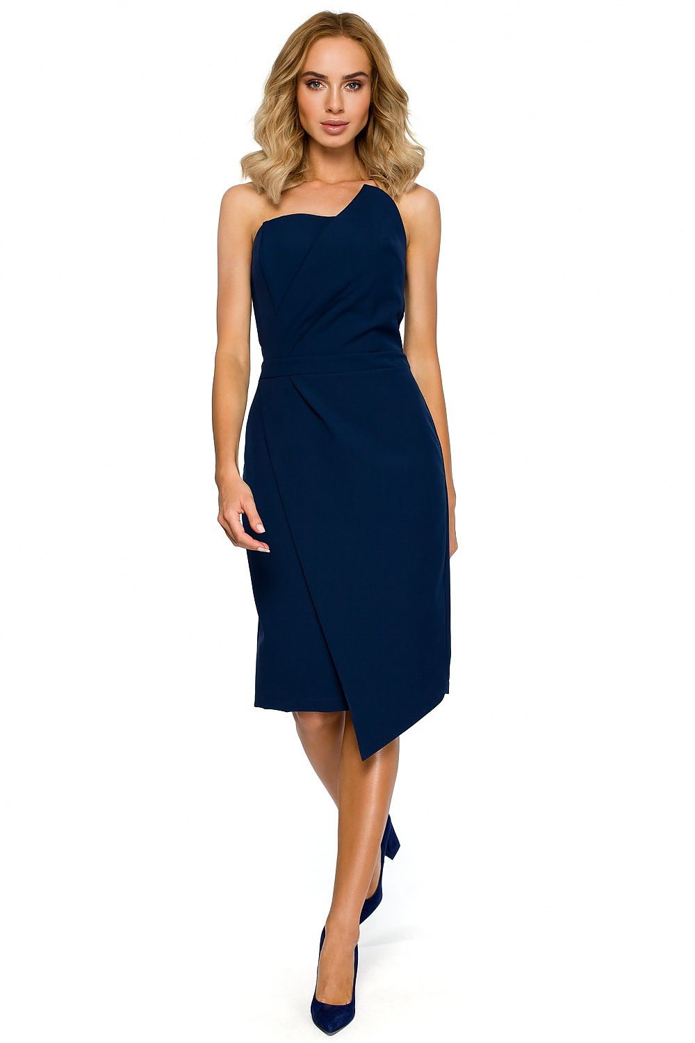 Woman wearing a navy blue one-shoulder dress on a white background