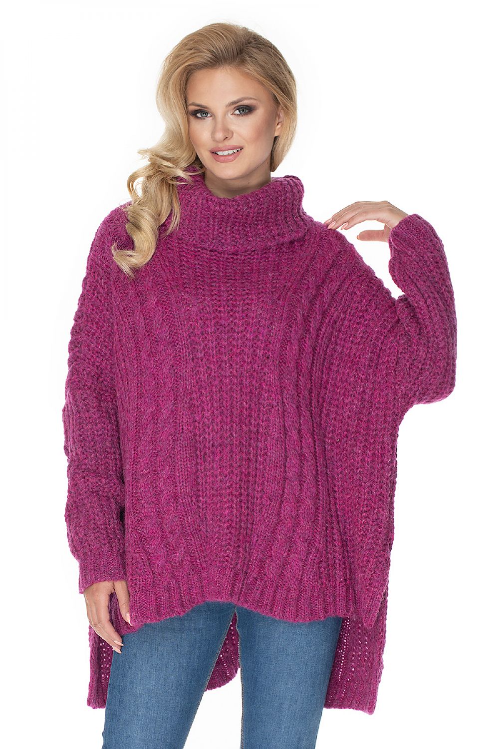 Woman wearing a pink knitted sweater on a white background