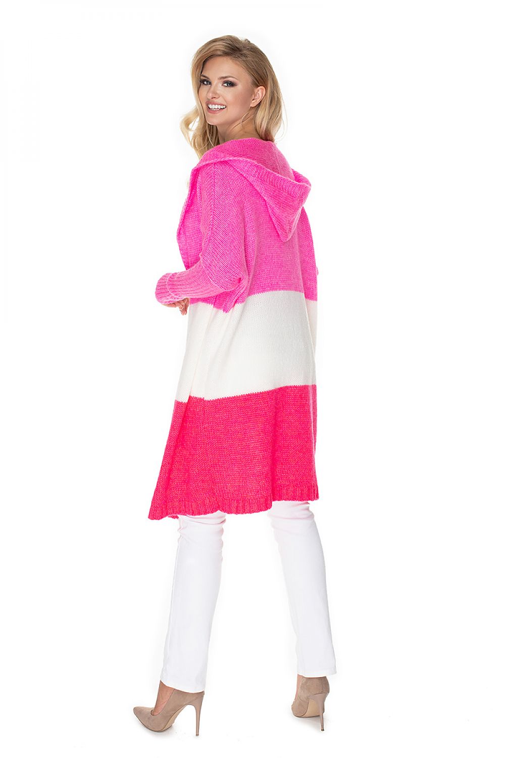 Woman wearing a pink and white color-blocked outfit on a white background