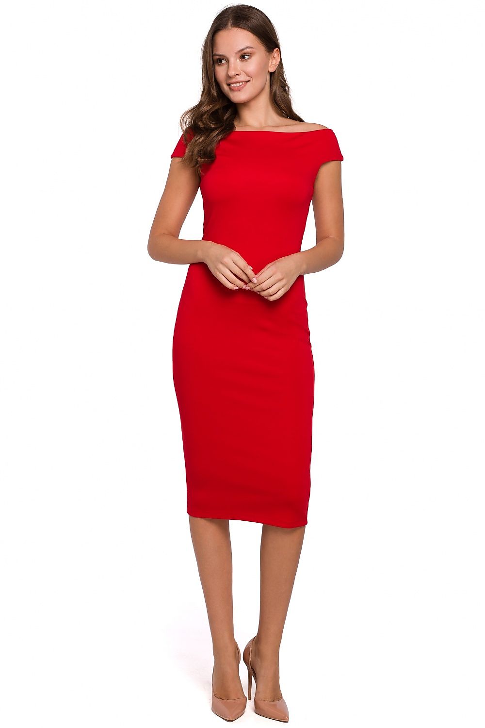 Woman wearing a red dress on a white background