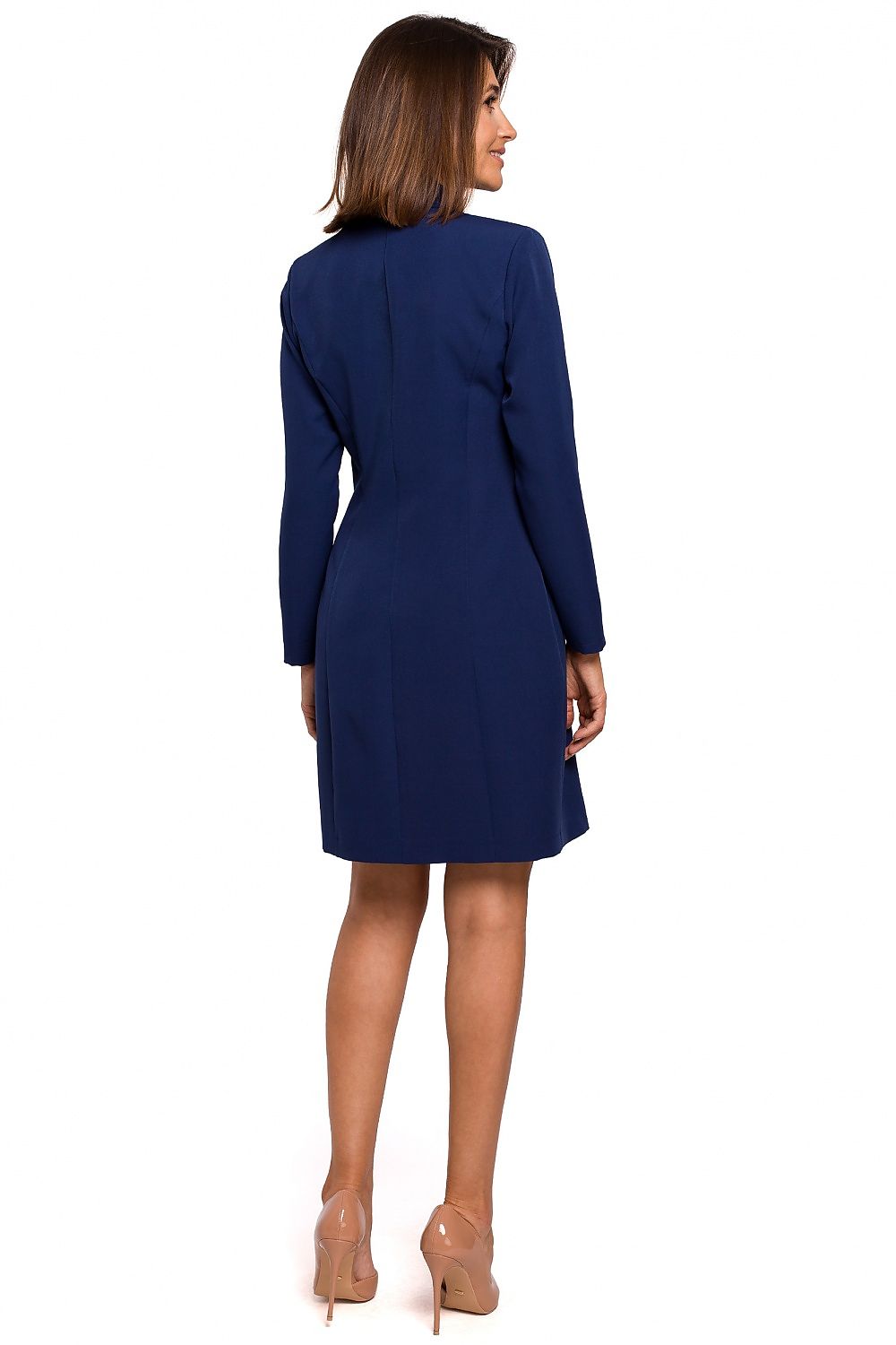 Woman wearing a blue dress on a white background