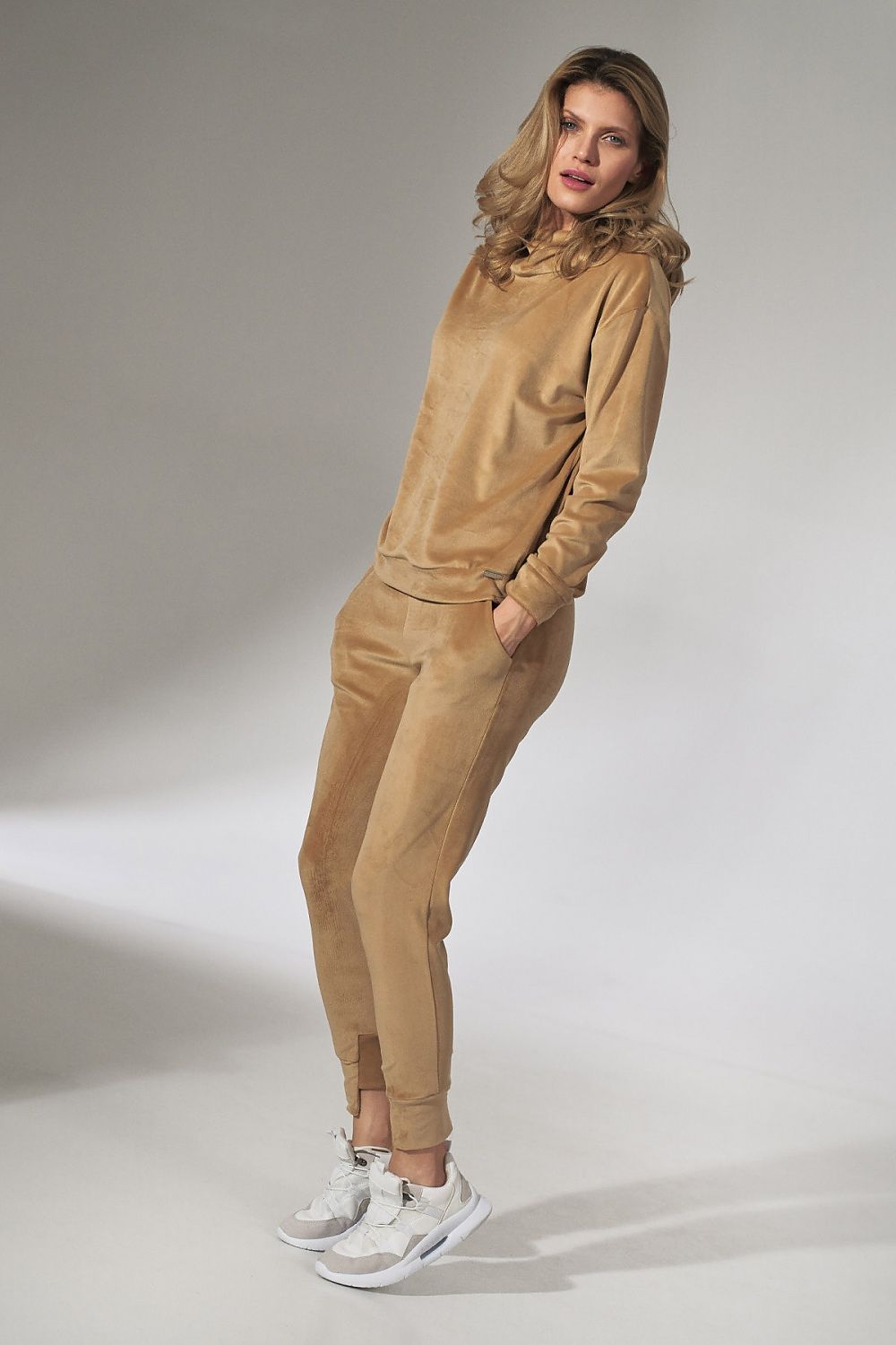  beige velour hoodie with relaxed fit, stand-up collar and long sleeves.