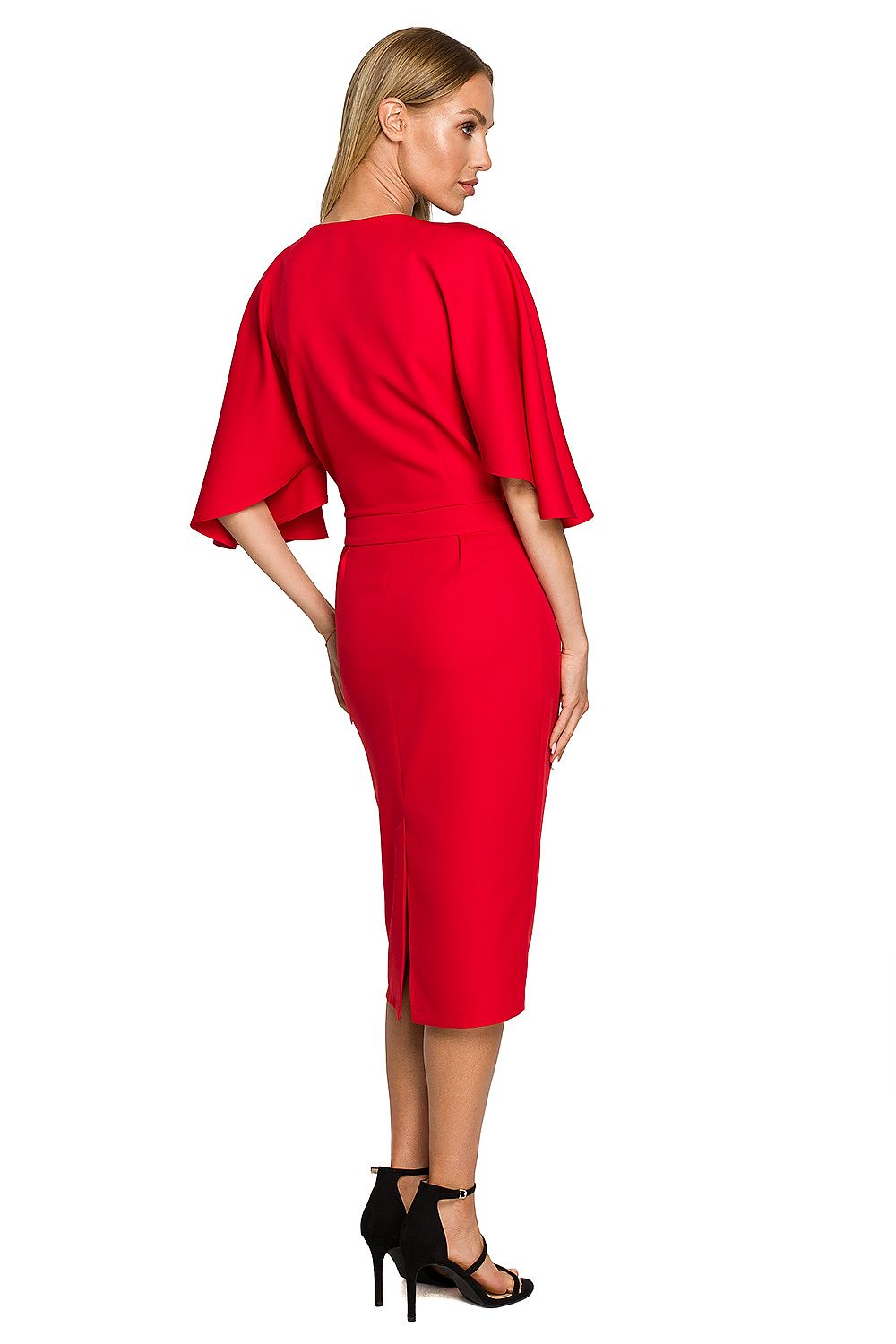 Woman wearing a red dress with a white background