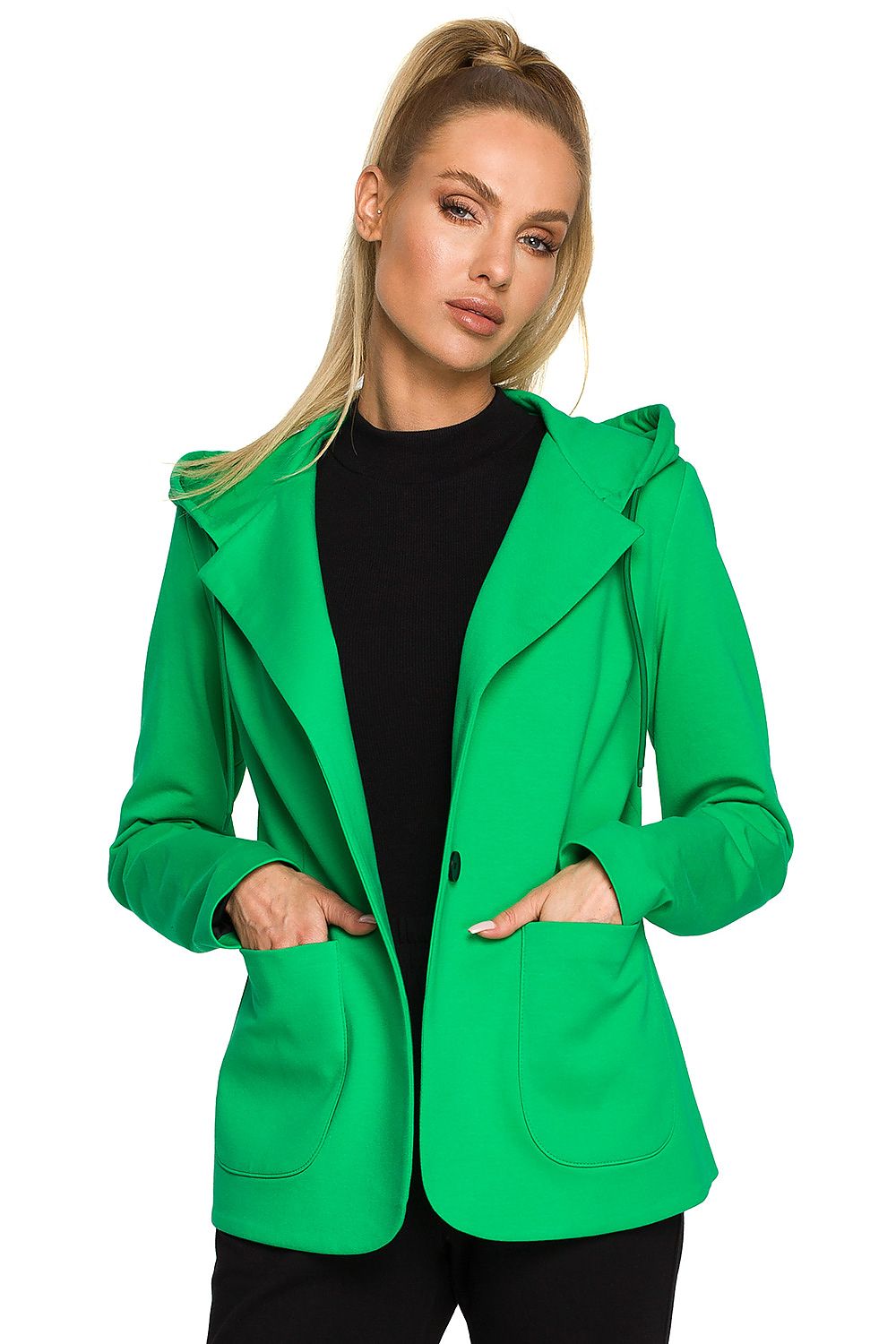 Woman wearing a green jacket on a white background