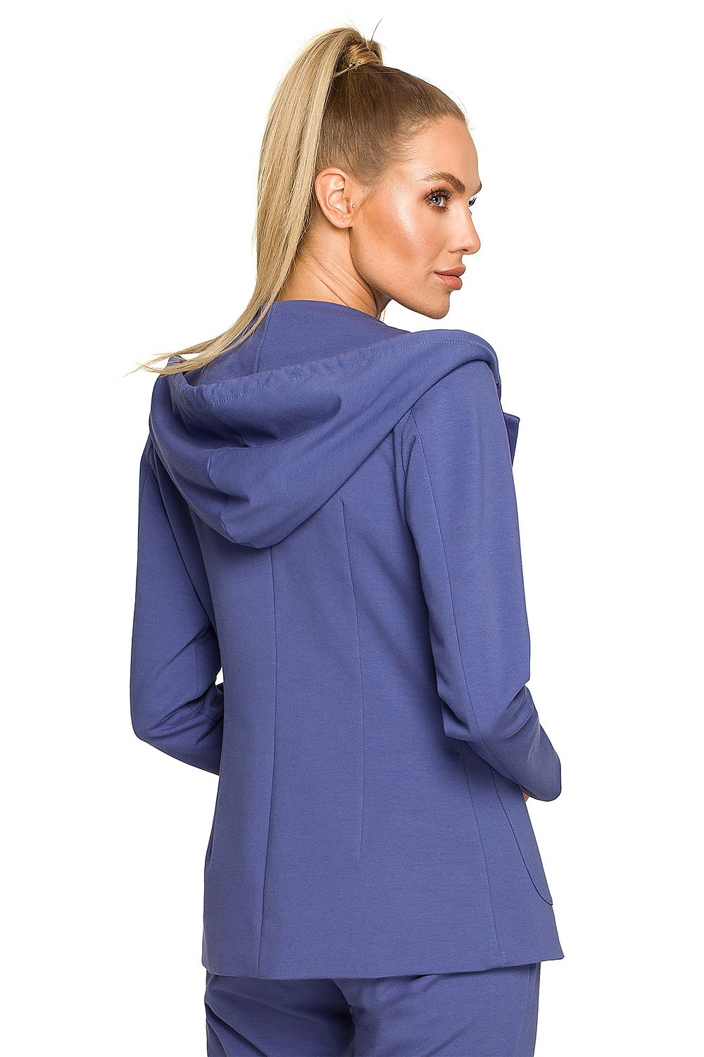 Woman wearing a blue outfit with a hood on a white background