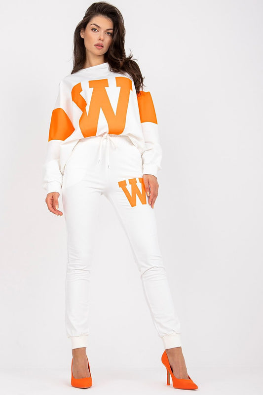 Woman wearing a white and orange outfit with 'W' logo on a white background
