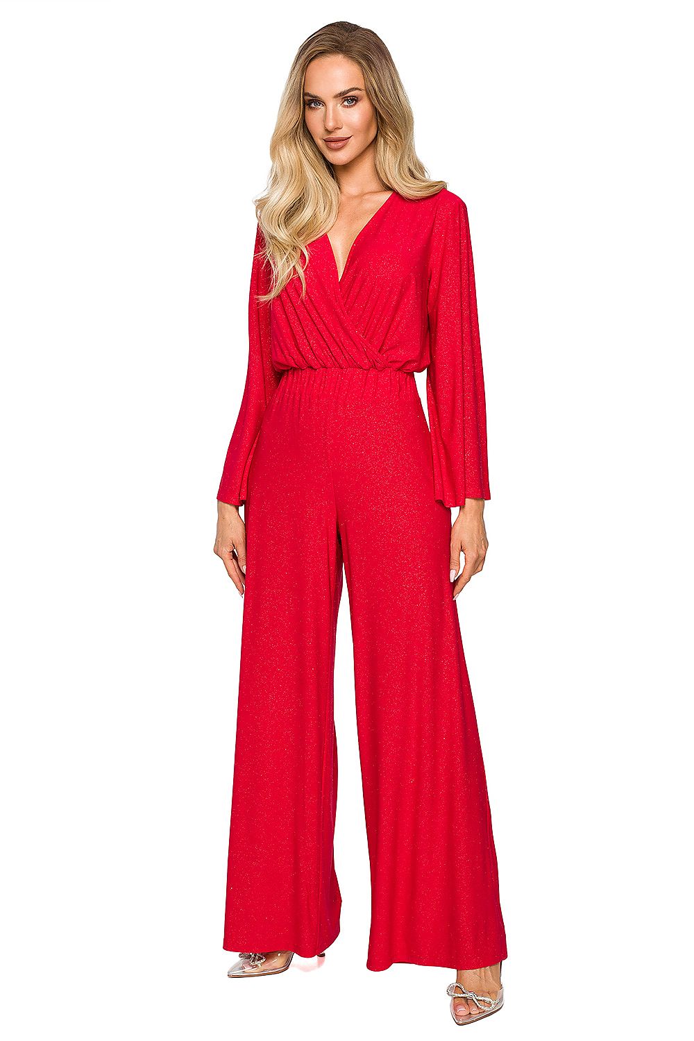 Woman wearing a red jumpsuit on a white background